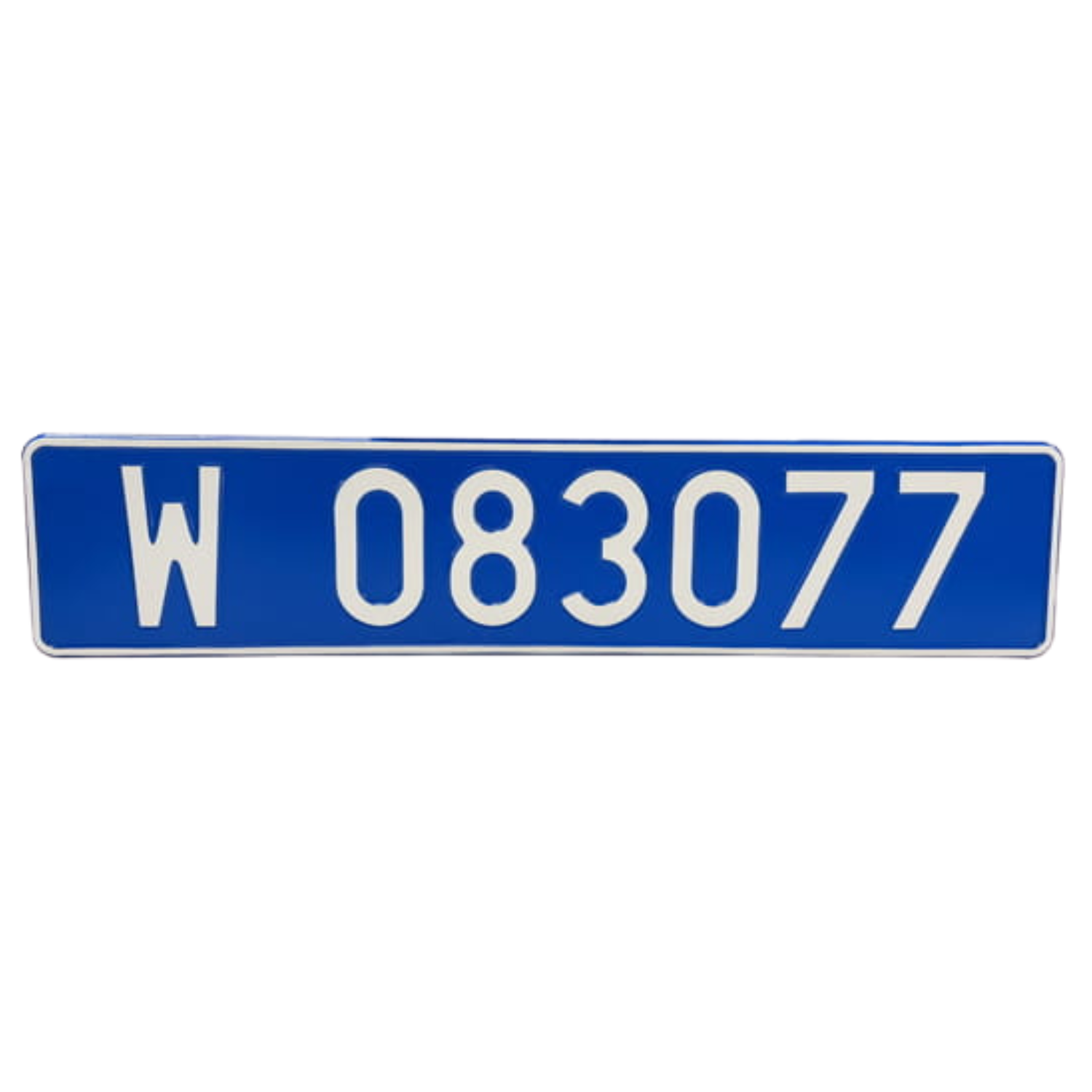 Niebieska tablica rejestracyjna z białym oznaczeniem W 083077, przedstawiona z przodu na białym tle. Tablica ma podłużny format, jasne obramowanie oraz wyraźne, wypukłe znaki.